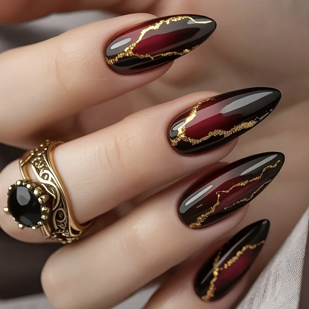 Glossy Stiletto Nail Art Extensions with Gold Accents Bowlift