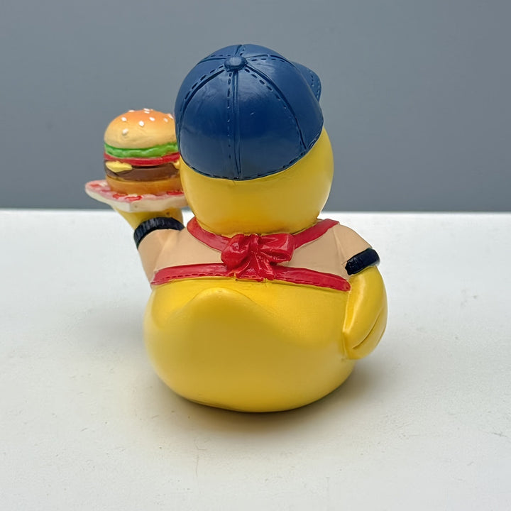 Funny rubber duck as grill master Bowlift