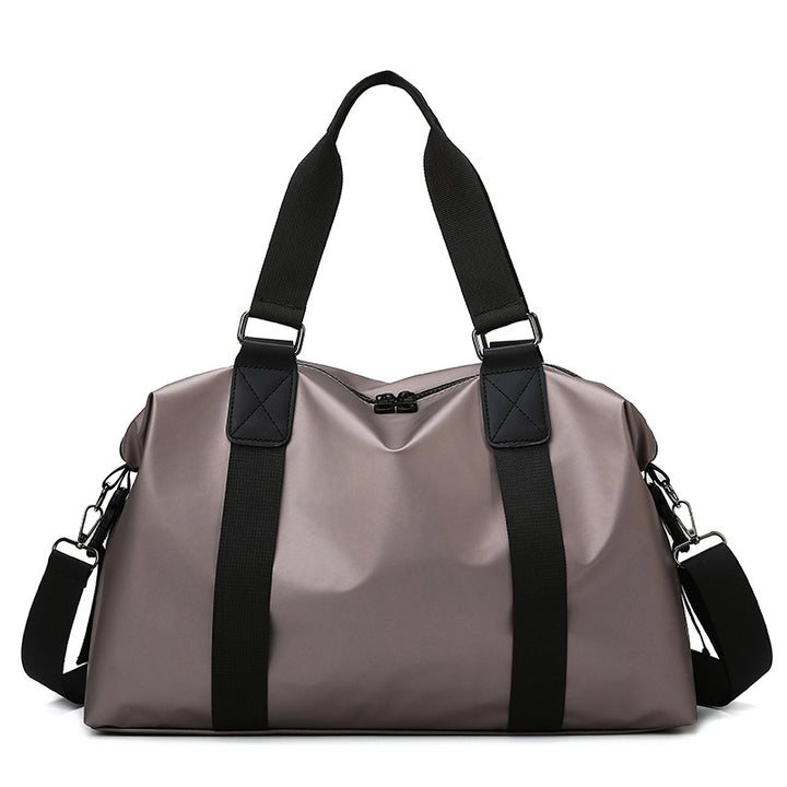 Athletic travel bag made of weather-resistant material with adjustable carrying handles Bowlift