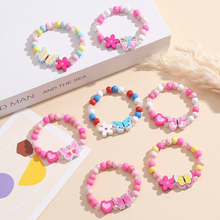 Playful bracelet with heart and butterfly charms Bowlift