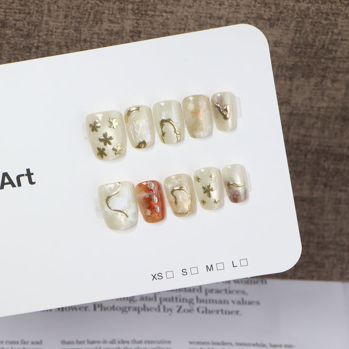Elegant Press-On Nail Art Set with Unique Metallic Designs Bowlift