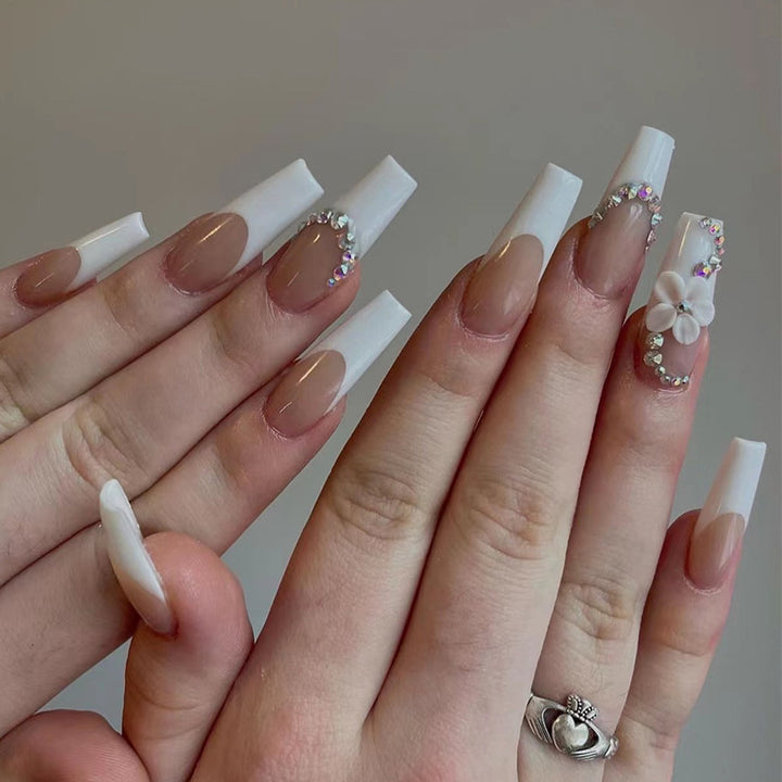 Creative artificial nails with elegant rhinestone and floral accents Bowlift