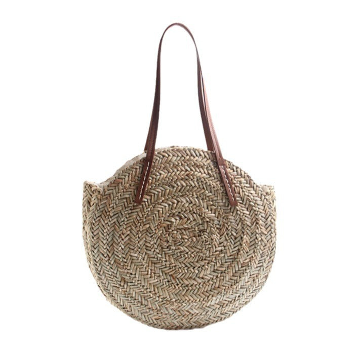 Braided straw beach bag with elegant leather handles Bowlift