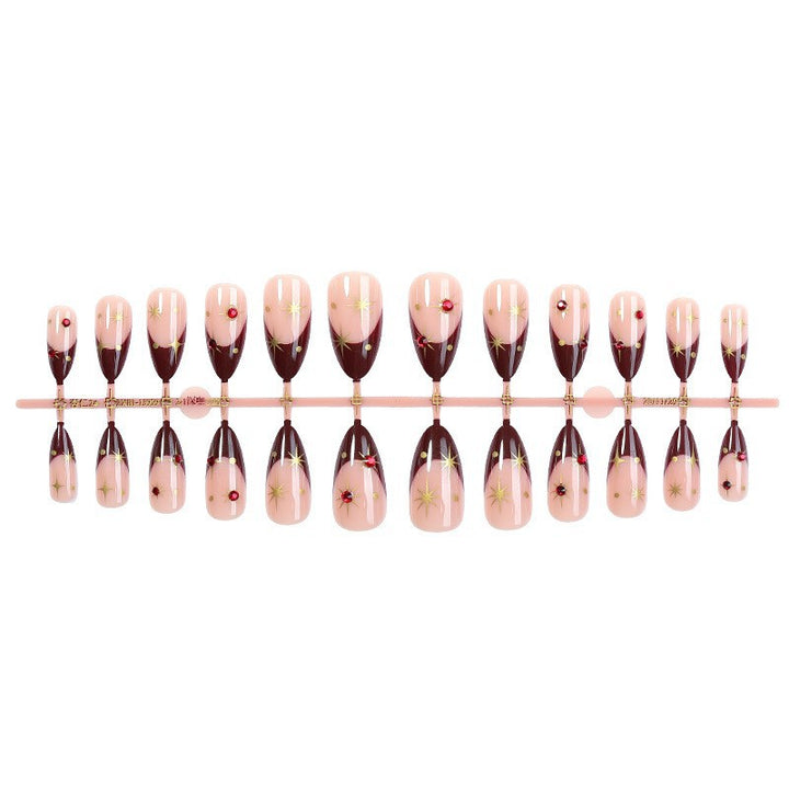 Elegant Pointed Press-On Nail Set with Decorative Accents Bowlift
