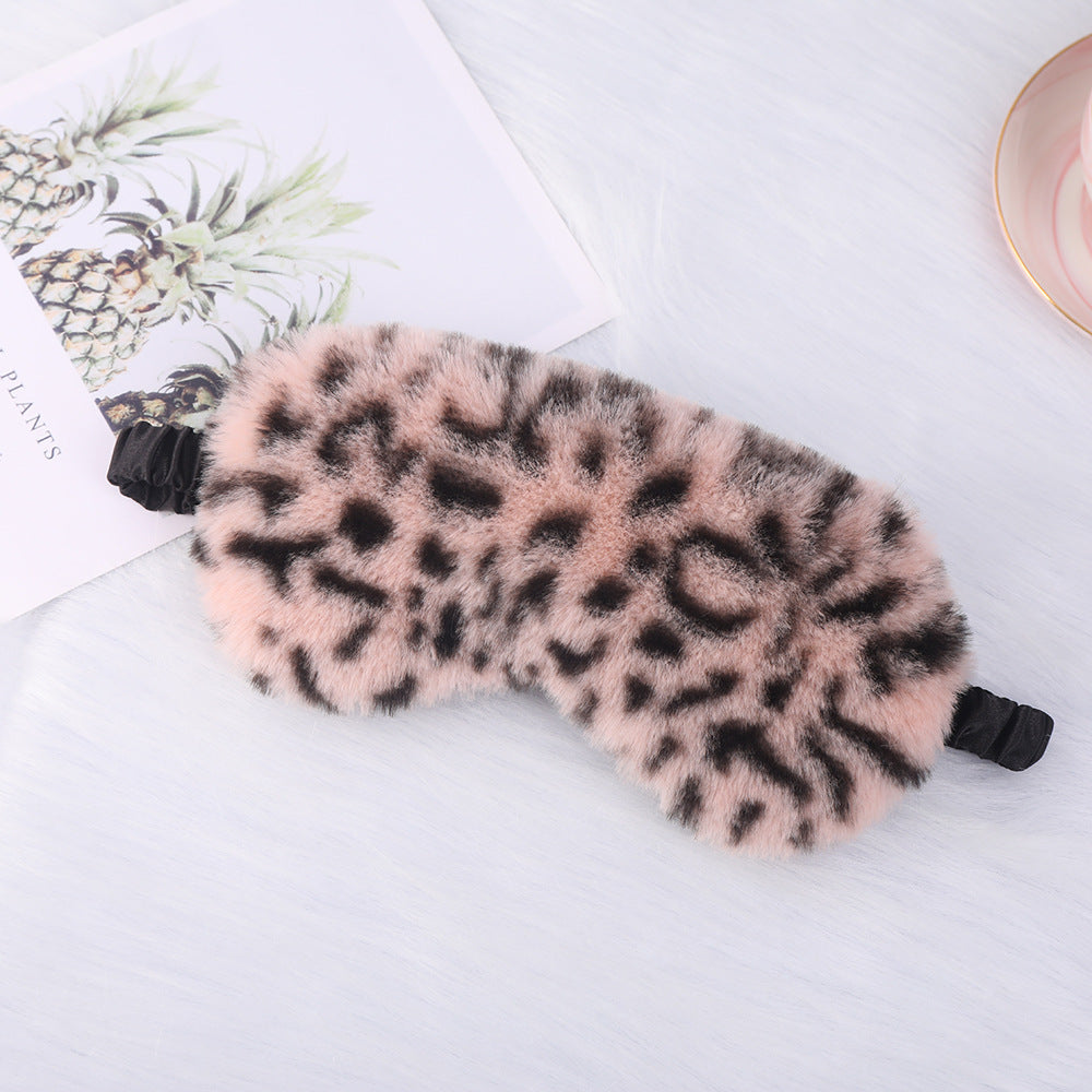 Women's cuddly faux fur sleep mask with heart-embossed surface and gathered comfort band Bowlift