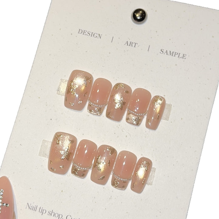 Artificial nails with elegant gold designs Bowlift