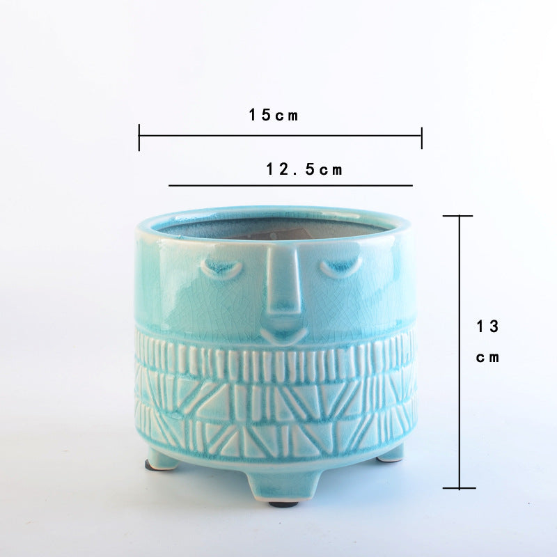 Decorative plant pot with facial features Bowlift