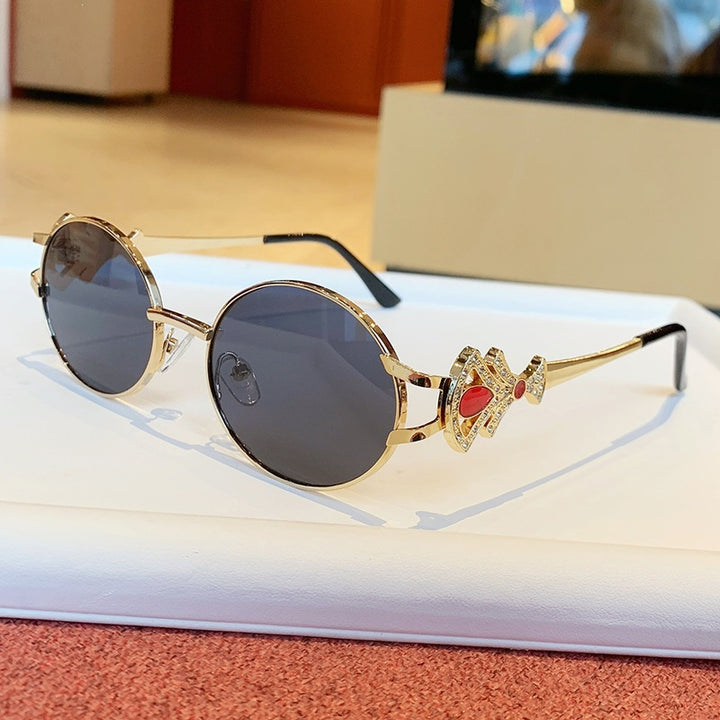 Ladies elegant rectangular sunglasses with glamorous embellishments Bowlift
