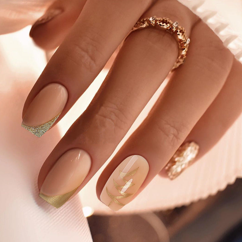 Artificial nail set with elegant gold accents Bowlift