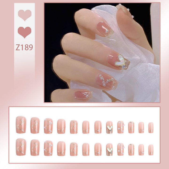 Artificial nail set with elegant pearl and glitter accents Bowlift