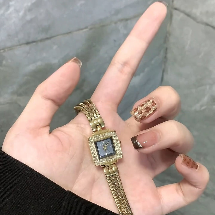 Elegant wristwatch with square dial and luxurious mesh band Bowlift