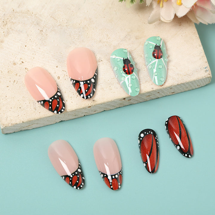 Creative nail art with elaborate butterfly and flower designs Bowlift