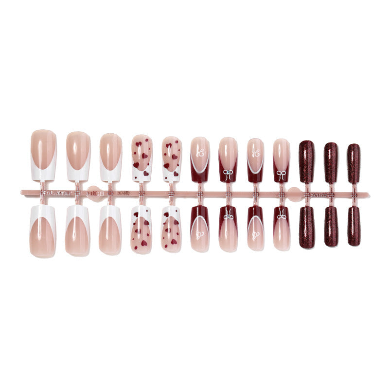 Elegant Press-On Nail Set with Artistic Heart and Glossy Finish Bowlift