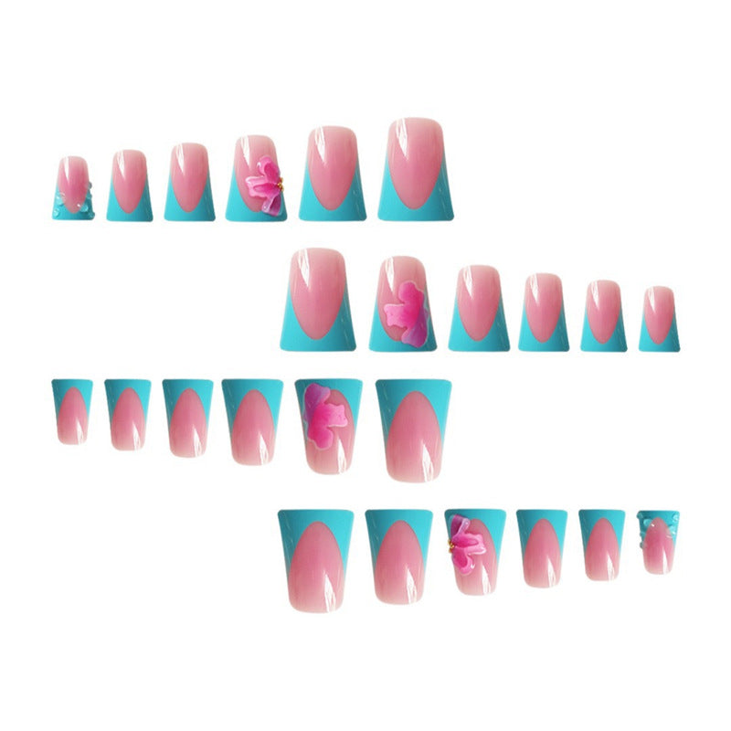 Artistic Press-On Nail Extensions with Floral Accents Bowlift