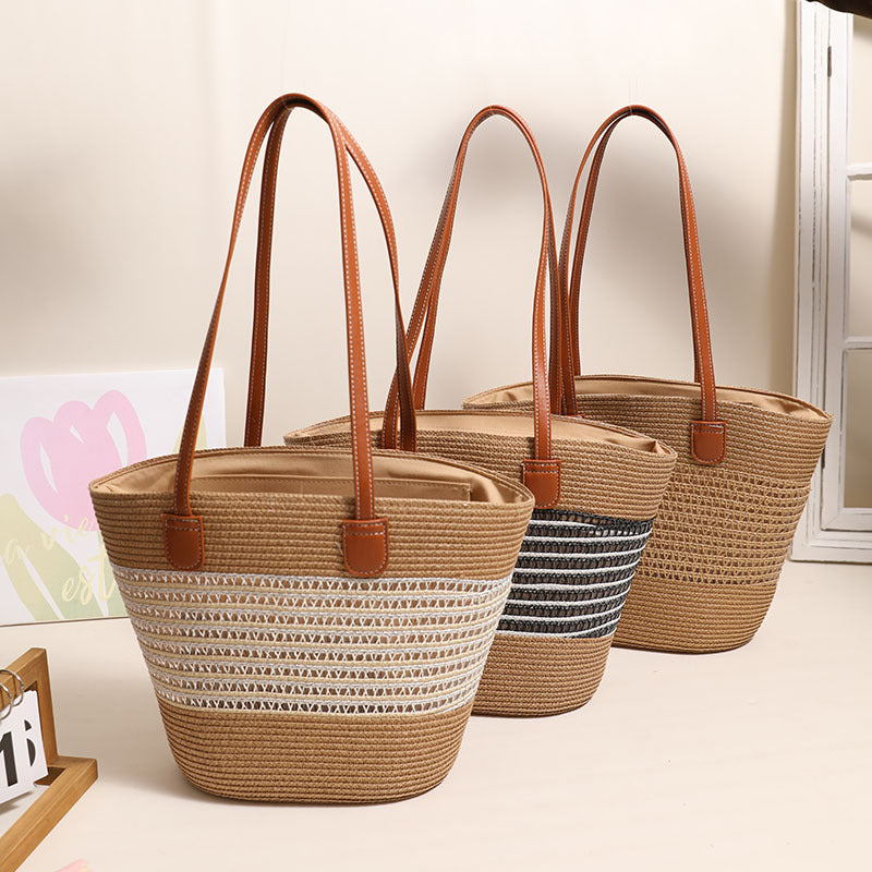 Elegant Bast bag with leather accents Bowlift