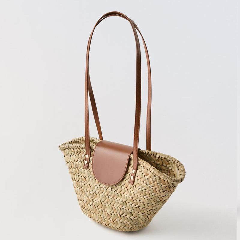 Handcrafted basket bag with leather flap Bowlift