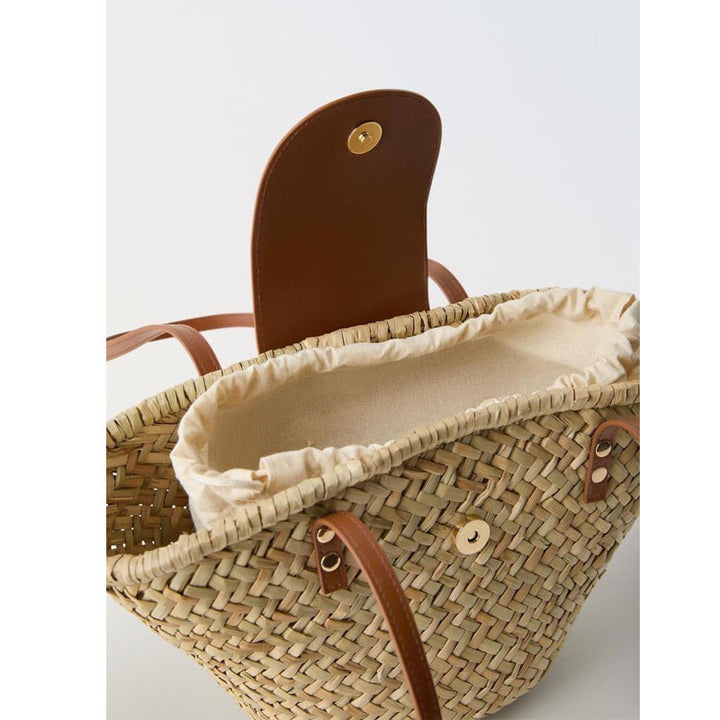 Handcrafted basket bag with leather flap Bowlift