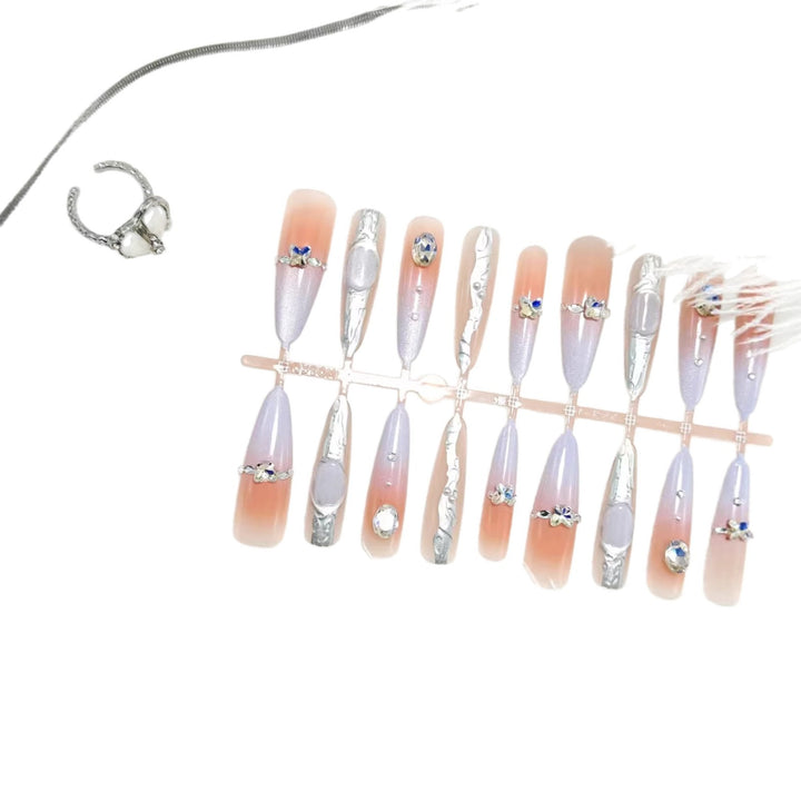 Artificial nails with elegant glitter design and fine 3D decorations Bowlift