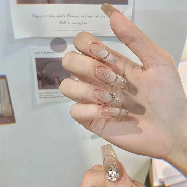 Artful French Tip Art Nails with Rhinestone Accents Bowlift