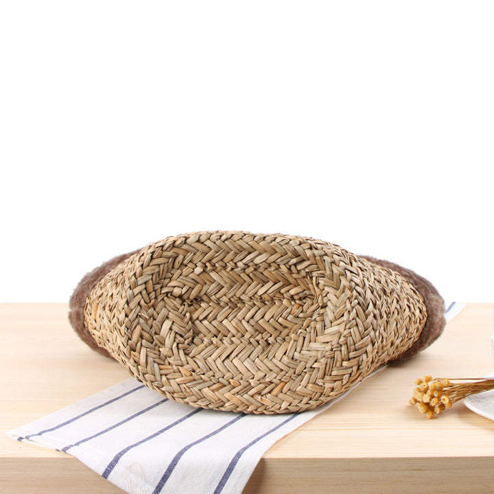 Braided handbag with luxurious faux fur trim Bowlift