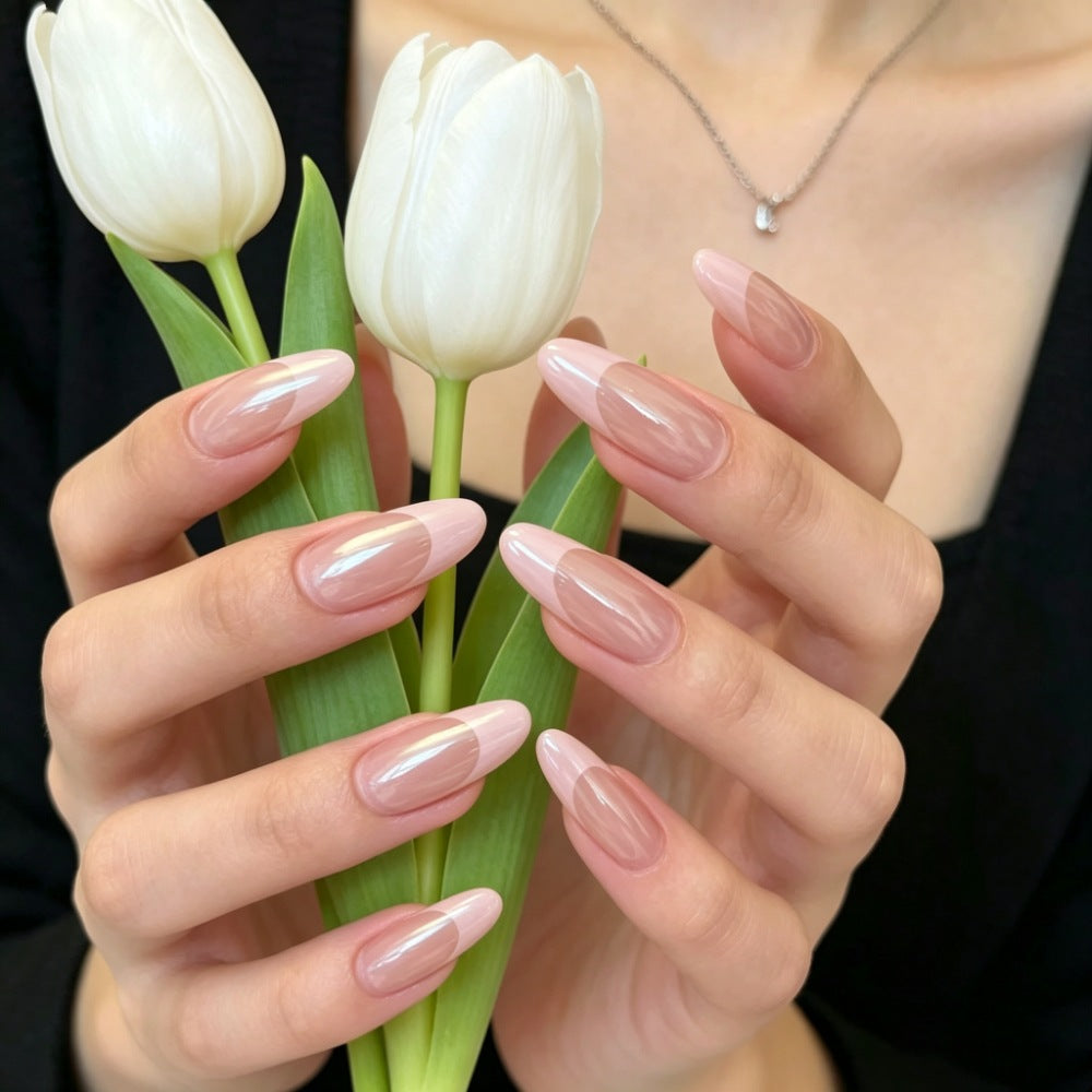 Artificial nails in elegant French design Bowlift