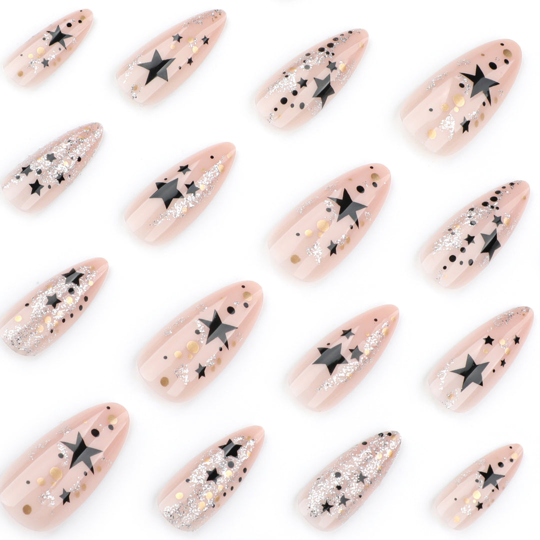 Artistic stiletto nails with glitter and star design Bowlift