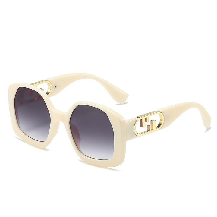 Women oversized sunglasses with extravagant geometric frame and elegant accents Bowlift