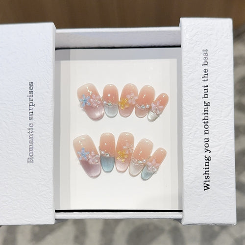 Romantic artificial nails with floral accents Bowlift