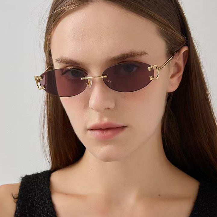 Women's elegant oval-shaped sunglasses with fashionable metal frame Bowlift
