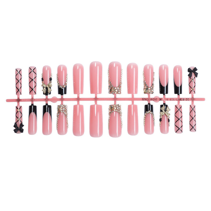 Artificial Nail Set with Glamorous Decorations and Elegant Accents Bowlift