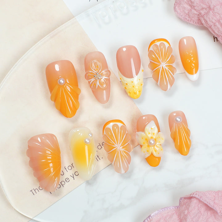 Creative nail art set with floral and glitter embellishments Bowlift