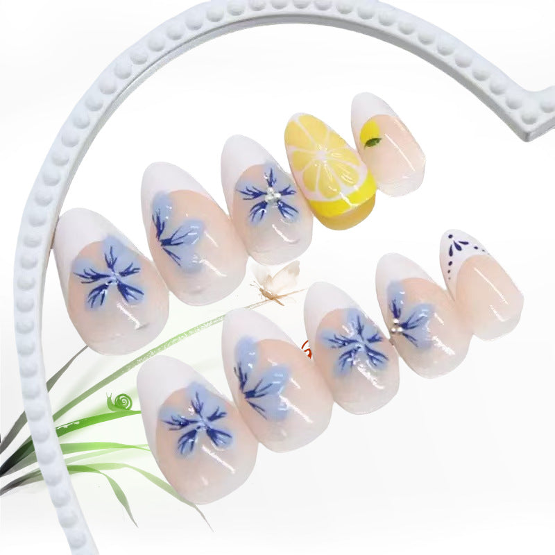 Artistic artificial nails with floral and fruity accents Bowlift