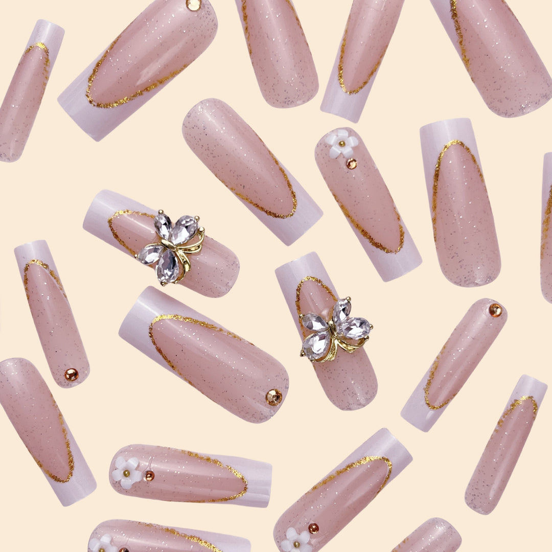Elegant Gold Accented Stiletto Nail Extensions Bowlift