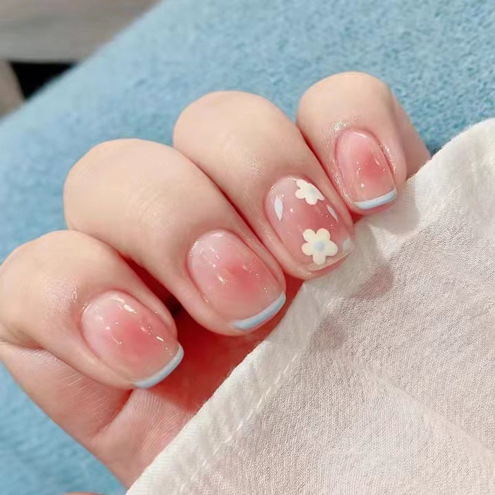 Artistic gel nails with delicate floral designs Bowlift