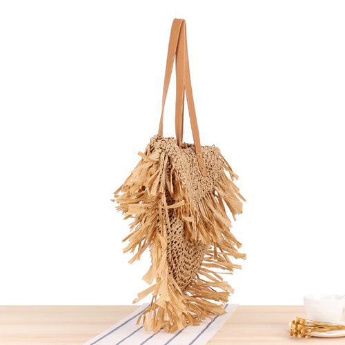 Bast crossbody bag with fringed design Bowlift