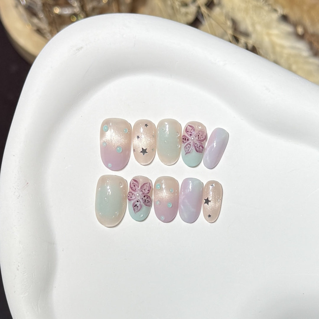 Floral-Inspired Press-On Nail Art Set with Star Accents Bowlift