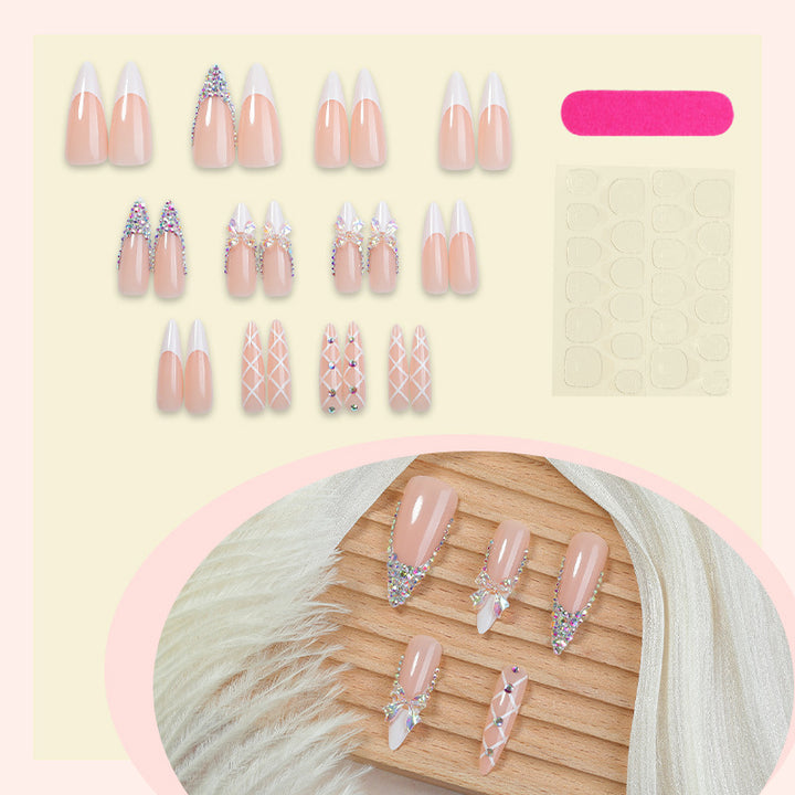 Acrylic nail set with luxurious rhinestone embellishments and bow accents Bowlift