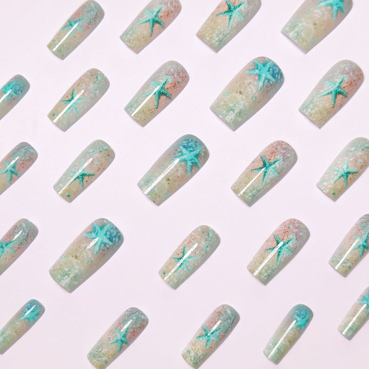 Glittering artificial nails with maritime star motif Bowlift
