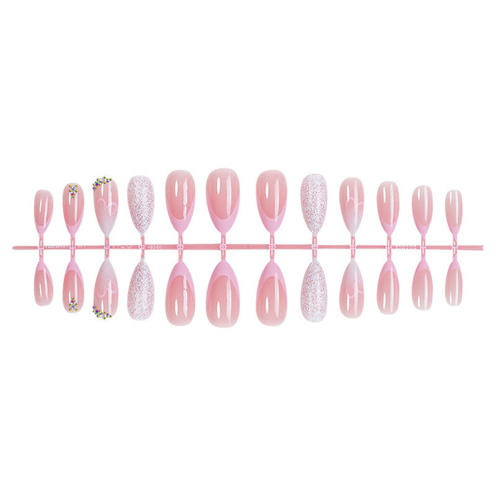 Artificial nail set with glitter and flower decorations Bowlift
