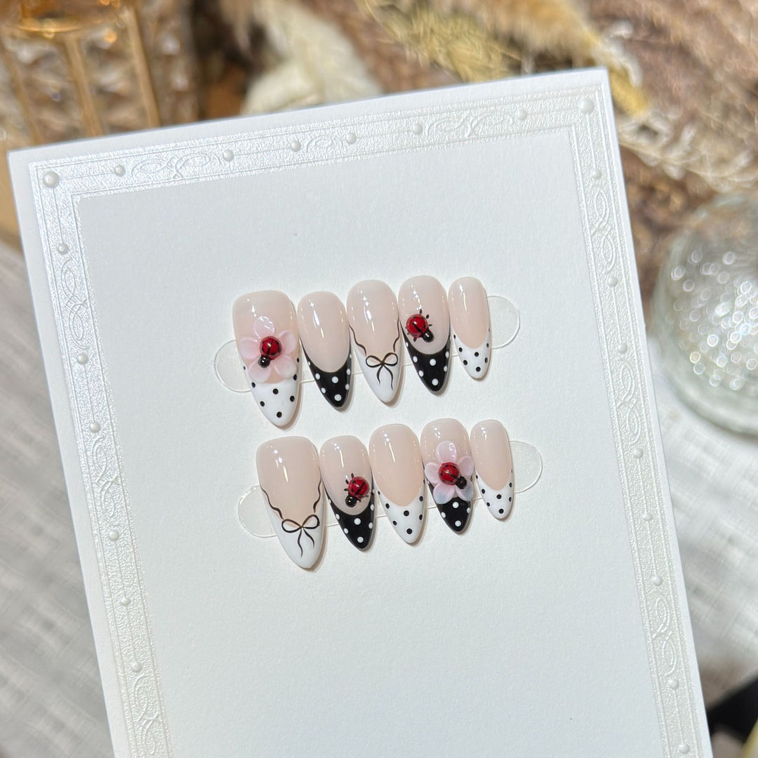 Artistic Stiletto Press-On Nail Set with Floral and Insect Designs Bowlift