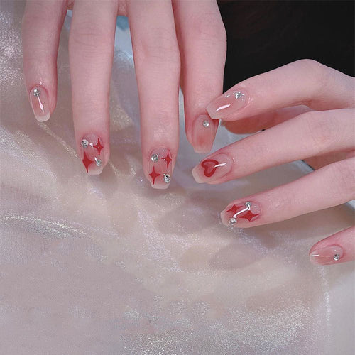 Nail art set with sparkling rhinestone details and heart motifs Bowlift