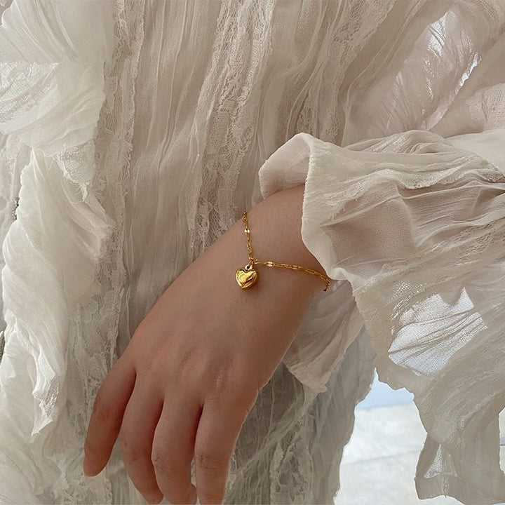 Heart-Shaped Charm Bracelet Bowlift