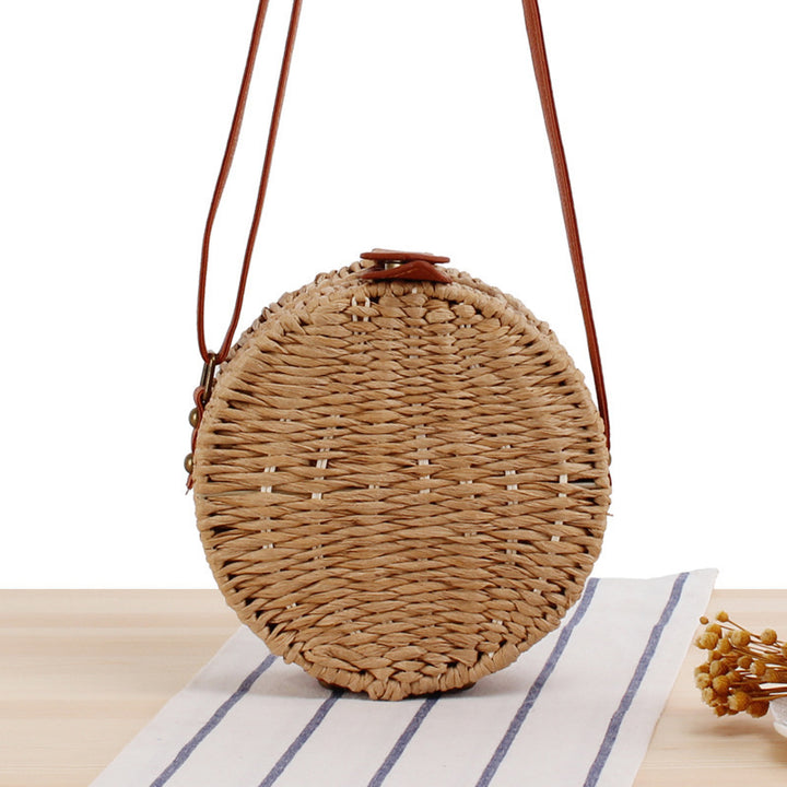 Round basket bag with leather accents Bowlift