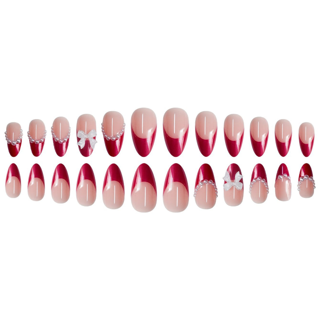 Decorative Stiletto Press-On Nails with Pearls and Bow Accents Bowlift