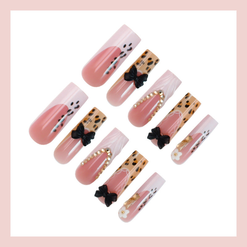 Artificial nails with elegant animal patterns and jewelry details Bowlift
