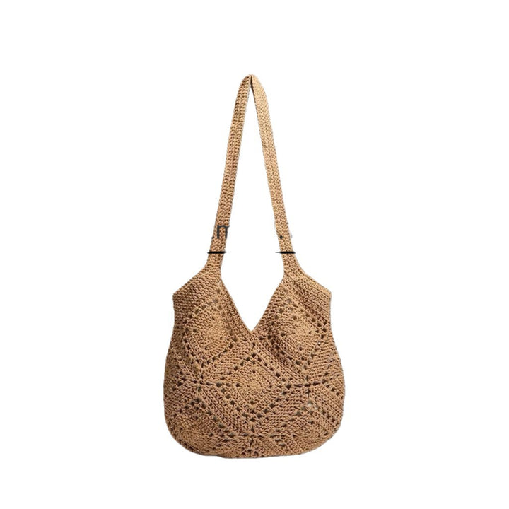 Handbag made of braided natural material with tassel details Bowlift