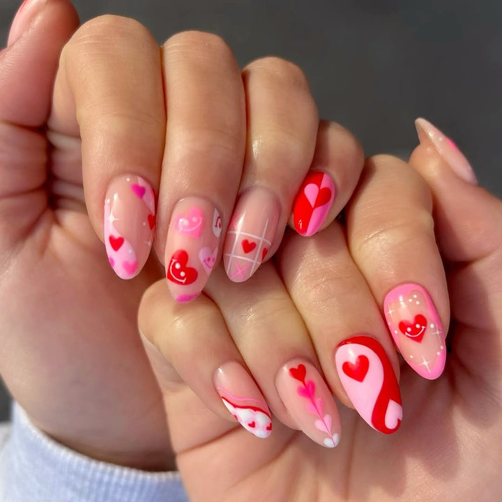 Acrylic nail set with romantic heart motifs and modern designs Bowlift