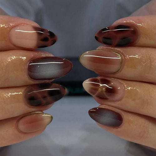 Glamorous acrylic stiletto nails with elegant glitter design Bowlift