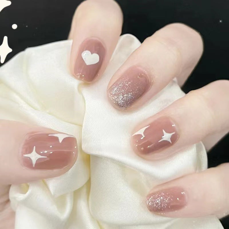 Artful nail art with heart and star design Bowlift