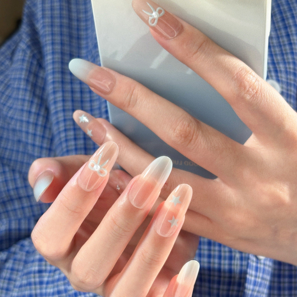 Glamorous Ombre Press-On Nail Set with Decorative Star and Bow Accents Bowlift